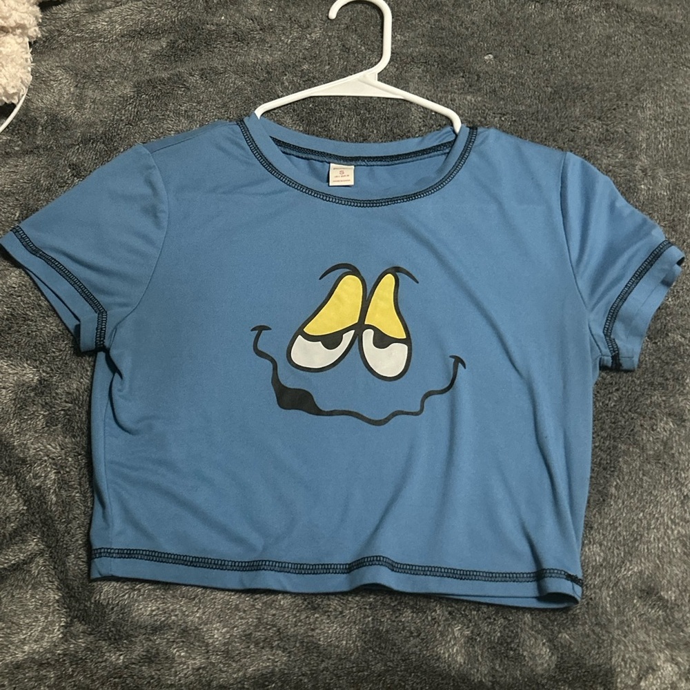 Blue Graphic Tee with Cartoon Face